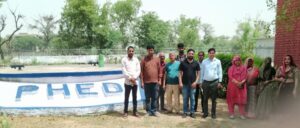 सिगड़ी वाटर वर्क्स परिसर में ग्राम जल एवं सीवरेज समिति एवं विभागीय टीम।