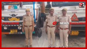 राजमार्ग पर नियम तोड़ने वालों के खिलाफ कार्रवाई करते पुलिस अधिकारी
