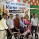 ‘विरासत ए संस्कार’ भाषण प्रतियोगिता में विजेता छात्राओं को साइकिल देकर सम्मानित करते अतिथि