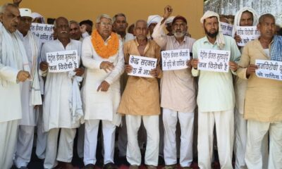 पेट्रोल-डीजल कीमतों में बढ़ोतरी के विरोध में मंडी अटेली में प्रदर्शन करते ग्रामीण।