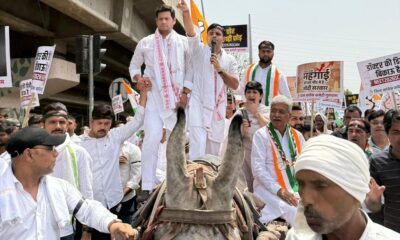 गुरुग्राम में महंगाई और नीट पेपर लीक के विरोध में प्रदर्शन करते कांग्रेस नेता और कार्यकर्ता।