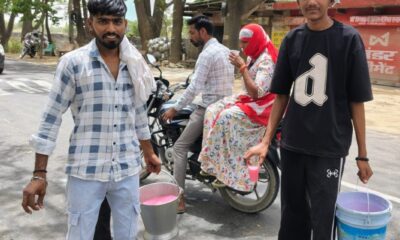 -बिहाली में अटेली-बहरोड़ सड़क मार्ग पर मीठा पानी पिलाते हुए।