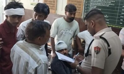 घायल युवक शिंपू से पूछताछ करते पुलिस कर्मी