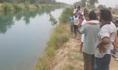 भाखड़ा नहर में गिरी कार और मौके पर एकत्रित ग्रामीण।