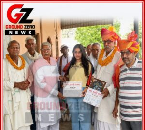 गोसेवक महिपाल सिंह खरब तथा प्रतिभाशाली छात्रा हिमांशी को सम्मानित करते हुए नेताजी अतरलाल।