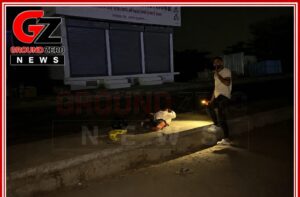 NH-148B हाईवे पर बंद पड़ी लाइटों के बीच हादसे के बाद जुटे स्थानीय लोग।